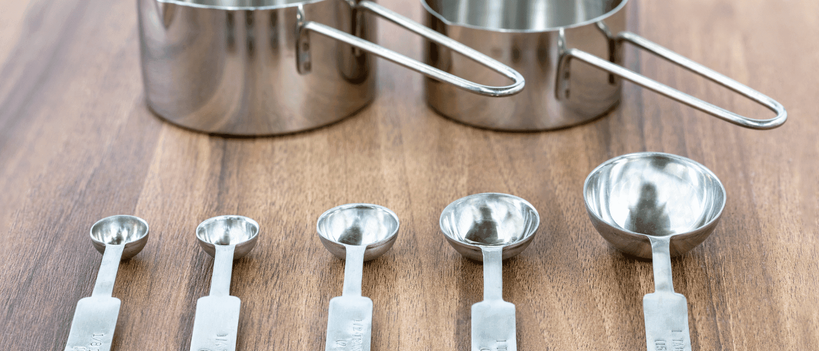 Measuring Cups & Spoons Set - Nesting cup and spoon sets for accurately measuring ingredients and portions.